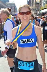 My friend, Dana, proudly displaying her Boston Marathon medal.